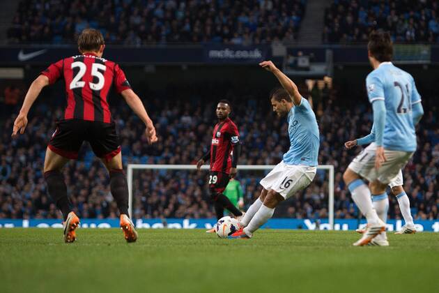 Sergio Kun Aguero of Manchester City scores his sides second goal - Barclays Premier League - Manchester City vs. West Bromwich Albion - Etihad Stadium - Manchester - England - 21st April 2014 - Pic by Philip Oldham SportImage EDITORIAL USE ONLY. No use with unauthorised audio, video, data, fixture lists, club league logos or live services. Online in-match use limited to 120 images, no video emulation. No use in betting, games or single club league player publications.