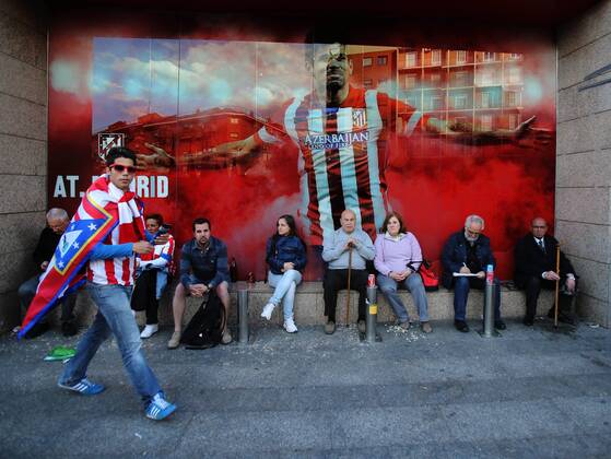 Atletico Madrid s fans wait outside the ground - Champions League, SemiFinal, First leg - Vicente Calderon Stadium - 22 04 2014 - EDITORIAL USE ONLY. No use with unauthorised audio, video, data, fixture lists, club league logos or live services. Online in-match use limited to 120 images, no video emulation. No use in betting, games or single club league player publications.