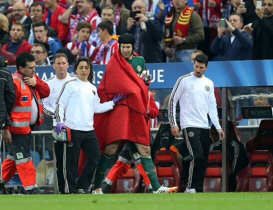Chelsea s Petr Cech goes off injured after hurting his arm Athletico Madrid vs FC Chelsea - Champions League, Semi Final, First leg - Vicente Calderon Stadium - 22 04 2014 - EDITORIAL USE ONLY. No use with unauthorised audio, video, data, fixture lists, club league logos or live services. Online in-match use limited to 120 images, no video emulation. No use in betting, games or single club league player publications.