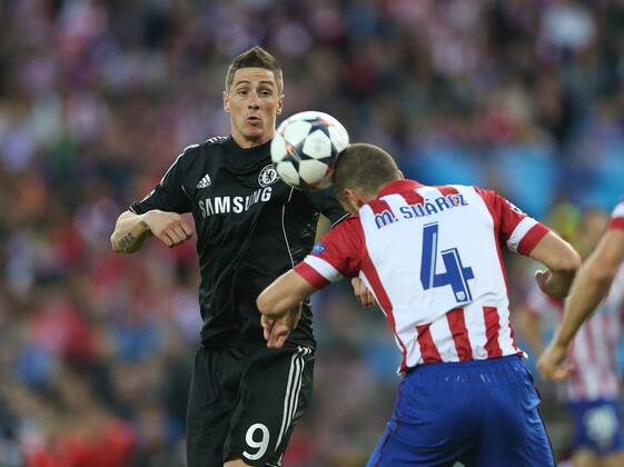 Athletico Madrid s Mario Suarez tussles with Chelsea s Fernando Torres Athletico Madrid vs Chelsea - Champions League, Semi Final, First leg - Vicente Calderon Stadium - 22 04 2014 - Pic David Klein Sportimage EDITORIAL USE ONLY. No use with unauthorised audio, video, data, fixture lists, club league logos or live services. Online in-match use limited to 120 images, no video emulation. No use in betting, games or single club league player publications.