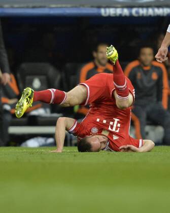 23.04.2014, Fussball Champions League 2013 2014, Halbfinale, Hinspiel, Real Madrid - FC Bayern München, im Santiago Bernabeu Stadion in Madrid, Spanien. Franck Ribery (München) am Boden. 