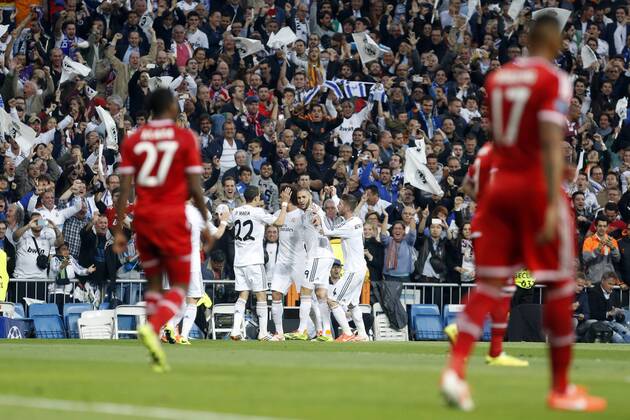 Real Madrid s Karim Benzema scores during Champions League soccer match Real Madrid v FC Bayern Munchen at Santiago Bernabeu stadium in Madrid, Spain. April 23, 2014.  (20187593)