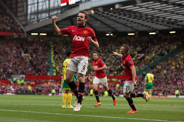 Juan Mata of Manchester United celebrates scoring his sides third goal - Barclays Premier League - Manchester United vs. Norwich - Old Trafford - Manchester - England - 19th April 2014 - Pic by Philip Oldham SportImage EDITORIAL USE ONLY. No use with unauthorised audio, video, data, fixture lists, club league logos or live services. Online in-match use limited to 120 images, no video emulation. No use in betting, games or single club league player publications.