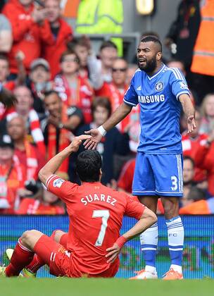 Luis Suarez of Liverpool claims Ashley Cole of Chelsea fouled him - Barclays Premier League - Liverpool v Chelsea - Anfield Stadium - Liverpool - England - 27th April 2014 - Pic SimonBellis Sportimage EDITORIAL USE ONLY. No use with unauthorised audio, video, data, fixture lists, club league logos or live services. Online in-match use limited to 120 images, no video emulation. No use in betting, games or single club league player publications.