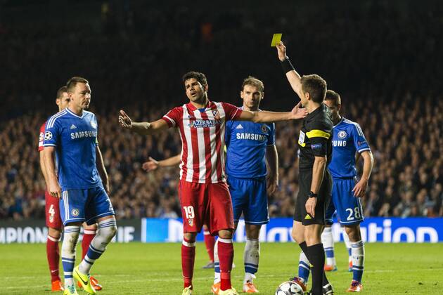 30.04.2014. London, England. Atletico Madrid& x2019;s Diego COSTA booked by referee Nicola RIZZOLI for time-wasting ahead of his penalty, during the Champions League Semi Final match between Chelsea and Atletico Madrid at Stamford Bridge. xCraigxMercerx  ActionPlus20448688