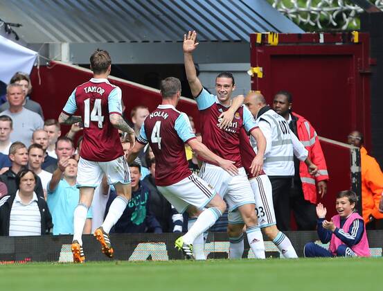 West Ham s Andy Carroll celebrates scoring his sides opening goal West Ham United vs Tottenham Hotspur - Barclays Premier League - Upton Park - London - UK - 03 05 2014 - EDITORIAL USE ONLY. No use with unauthorised audio, video, data, fixture lists, club league logos or live services. Online in-match use limited to 120 images, no video emulation. No use in betting, games or single club league player publications.
