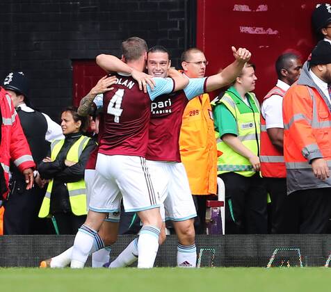 West Ham s Andy Carroll celebrates scoring his sides opening goal West Ham United vs Tottenham Hotspur - Barclays Premier League - Upton Park - London - UK - 03 05 2014 - EDITORIAL USE ONLY. No use with unauthorised audio, video, data, fixture lists, club league logos or live services. Online in-match use limited to 120 images, no video emulation. No use in betting, games or single club league player publications.