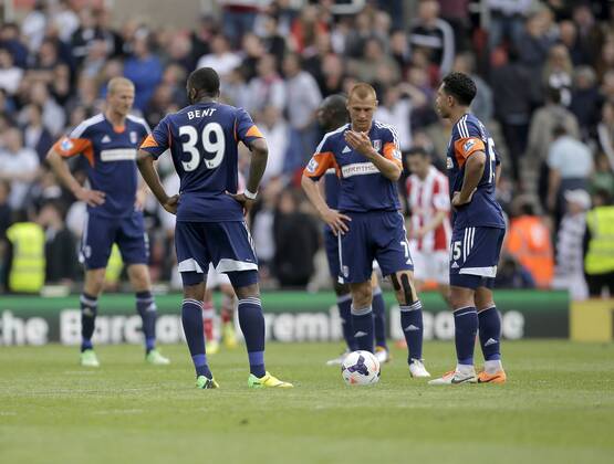 Dejection for Fulham following Stoke s opening goal - Football - Barclays Premier League - Stoke City vs Fulham - Britannia Stadium Stoke - Season 2013 14 - 3 5 2014 - Pic Malcolm Couzens Sportimage EDITORIAL USE ONLY. No use with unauthorised audio, video, data, fixture lists, club league logos or live services. Online in-match use limited to 120 images, no video emulation. No use in betting, games or single club league player publications.