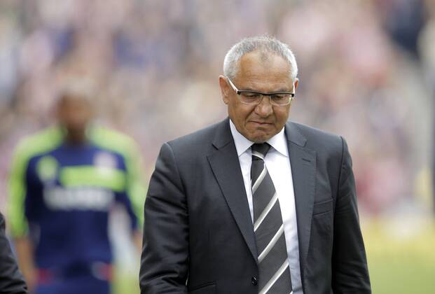 Dejection for Fulham manager Felix Magath at the end of the game as relegation is confirmed - Football - Barclays Premier League - Stoke City vs Fulham - Britannia Stadium Stoke - Season 2013 14 - 3 5 2014 - Pic Malcolm Couzens Sportimage EDITORIAL USE ONLY. No use with unauthorised audio, video, data, fixture lists, club league logos or live services. Online in-match use limited to 120 images, no video emulation. No use in betting, games or single club league player publications.