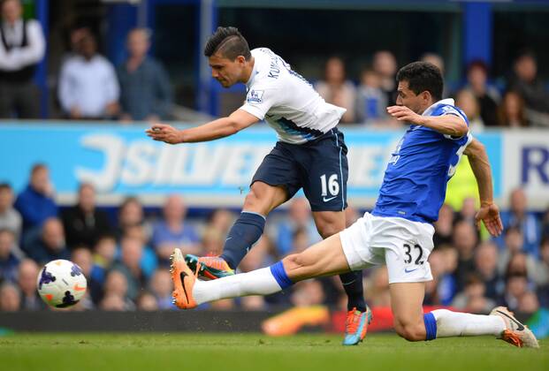 Sergio Kun Aguero of Manchester City gets past Antolin Alcaraz of Everton to score the equalising goal - Barclays Premier League - Everton v Manchester City - Goodison Park Stadium - Liverpool - England - 3rd May 2014 - Pic Simon Bellis Sportimage EDITORIAL USE ONLY. No use with unauthorised audio, video, data, fixture lists, club league logos or live services. Online in-match use limited to 120 images, no video emulation. No use in betting, games or single club league player publications.