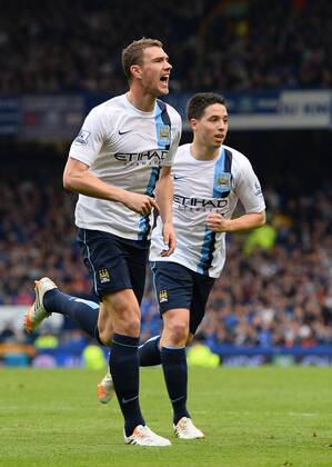 Edin Dzeko of Manchester City celebrates scoring the second goal - Barclays Premier League - Everton v Manchester City - Goodison Park Stadium - Liverpool - England - 3rd May 2014 - Pic Simon Bellis Sportimage EDITORIAL USE ONLY. No use with unauthorised audio, video, data, fixture lists, club league logos or live services. Online in-match use limited to 120 images, no video emulation. No use in betting, games or single club league player publications.