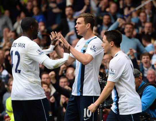 Edin Dzeko of Manchester City celebrates scoring the second goal - Barclays Premier League - Everton v Manchester City - Goodison Park Stadium - Liverpool - England - 3rd May 2014 - Pic Simon Bellis Sportimage EDITORIAL USE ONLY. No use with unauthorised audio, video, data, fixture lists, club league logos or live services. Online in-match use limited to 120 images, no video emulation. No use in betting, games or single club league player publications.