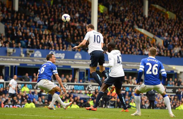 Edin Dzeko of Manchester City scores the second goal with a header - Barclays Premier League - Everton v Manchester City - Goodison Park Stadium - Liverpool - England - 3rd May 2014 - Pic Simon Bellis Sportimage EDITORIAL USE ONLY. No use with unauthorised audio, video, data, fixture lists, club league logos or live services. Online in-match use limited to 120 images, no video emulation. No use in betting, games or single club league player publications.