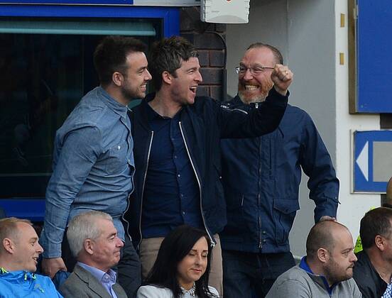 Former Oasis band member and Manchester City fan Noel Gallagher celebrates as the third goal goes in - Barclays Premier League - Everton v Manchester City - Goodison Park Stadium - Liverpool - England - 3rd May 2014 - Pic Simon Bellis Sportimage EDITORIAL USE ONLY. No use with unauthorised audio, video, data, fixture lists, club league logos or live services. Online in-match use limited to 120 images, no video emulation. No use in betting, games or single club league player publications.