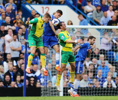 Chelsea s Nemanja Matic and Branislav Ivanovic tussle with Norwich s Ryan Bennett and Johan Elmander Chelsea vs Norwich - Barclays Premier League - Stamford Bridge - London - UK - 04 05 2014 - Pic David Klein Sportimage EDITORIAL USE ONLY. No use with unauthorised audio, video, data, fixture lists, club league logos or live services. Online in-match use limited to 120 images, no video emulation. No use in betting, games or single club league player publications.
