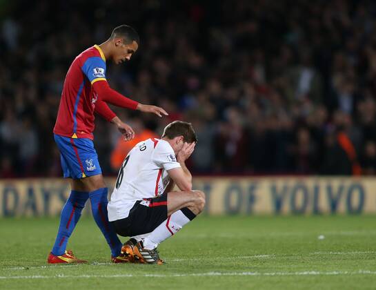 Crystal Palace s Tom Ince consoles Liverpool s Steven Gerrard at the final whistle Crystal Palace vs FC Liverpool - Barclays Premier League - Selhurst Park - London - UK - 05 05 2014 - EDITORIAL USE ONLY. No use with unauthorised audio, video, data, fixture lists, club league logos or live services. Online in-match use limited to 120 images, no video emulation. No use in betting, games or single club league player publications.