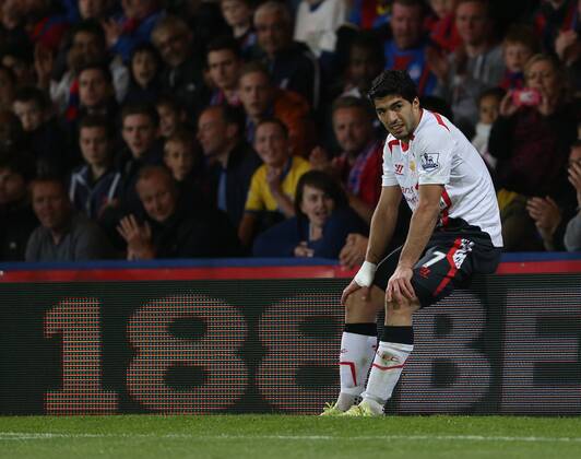 Liverpool s Luis Suarez looks on dejected Crystal Palace vs Liverpool - Barclays Premier League - Selhurst Park - London - UK - 05 05 2014 - Pic David Klein Sportimage EDITORIAL USE ONLY. No use with unauthorised audio, video, data, fixture lists, club league logos or live services. Online in-match use limited to 120 images, no video emulation. No use in betting, games or single club league player publications.