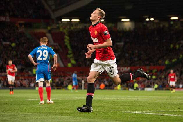 James Wilson of Manchester United celebrates his second goal - Barclays Premier League - Manchester United (ManU) vs. Hull City - Old Trafford - Manchester - England - 6th May 2014 - EDITORIAL USE ONLY. No use with unauthorised audio, video, data, fixture lists, club league logos or live services. Online in-match use limited to 120 images, no video emulation. No use in betting, games or single club league player publications.