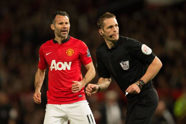 Ryan Giggs, interim manager of Manchester United gives referee Craig Pawson a piece of his mind - Barclays Premier League - Manchester United (ManU) vs. Hull City - Old Trafford - Manchester - England - 6th May 2014 - EDITORIAL USE ONLY. No use with unauthorised audio, video, data, fixture lists, club league logos or live services. Online in-match use limited to 120 images, no video emulation. No use in betting, games or single club league player publications.