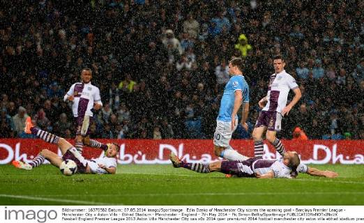 Edin Dzeko of Manchester City scores the opening goal - Barclays Premier League - Manchester City v Aston Villa - Etihad Stadium - Manchester - England - 7th May 2014 - Pic Simon Bellis Sportimage EDITORIAL USE ONLY. No use with unauthorised audio, video, data, fixture lists, club league logos or live services. Online in-match use limited to 120 images, no video emulation. No use in betting, games or single club league player publications.