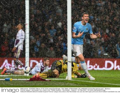 Edin Dzeko of Manchester City celebrates scoring the opening goal - Barclays Premier League - Manchester City v Aston Villa - Etihad Stadium - Manchester - England - 7th May 2014 - Pic Simon Bellis Sportimage EDITORIAL USE ONLY. No use with unauthorised audio, video, data, fixture lists, club league logos or live services. Online in-match use limited to 120 images, no video emulation. No use in betting, games or single club league player publications.