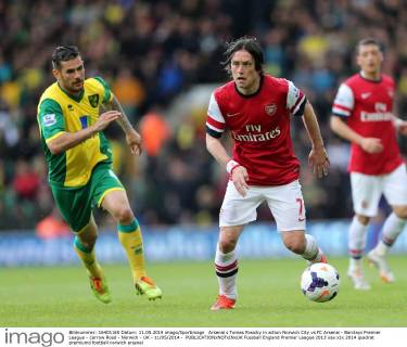 Arsenal s Tomas Rosicky in action Norwich City vs FC Arsenal - Barclays Premier League - Carrow Road - Norwich - UK - 11 05 2014 - EDITORIAL USE ONLY. No use with unauthorised audio, video, data, fixture lists, club league logos or live services. Online in-match use limited to 120 images, no video emulation. No use in betting, games or single club league player publications.
