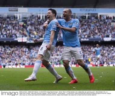 Samir Nasri of Manchester City celebrates his opening goal - Manchester City vs. West Ham United - Barclays Premier League - Etihad Stadium - Manchester - 11 05 2014 EDITORIAL USE ONLY. No use with unauthorised audio, video, data, fixture lists, club league logos or live services. Online in-match use limited to 120 images, no video emulation. No use in betting, games or single club league player publications.