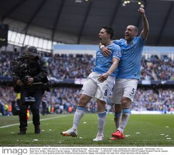 Samir Nasri of Manchester City celebrates his opening goal - Manchester City vs. West Ham United - Barclays Premier League - Etihad Stadium - Manchester - 11 05 2014 EDITORIAL USE ONLY. No use with unauthorised audio, video, data, fixture lists, club league logos or live services. Online in-match use limited to 120 images, no video emulation. No use in betting, games or single club league player publications.