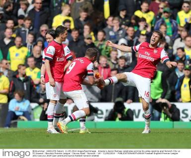 Arsenal s Aaron Ramsey celebrates scoring his sides opening goal Norwich City vs FC Arsenal - Barclays Premier League - Carrow Road - Norwich - UK - 11 05 2014 - EDITORIAL USE ONLY. No use with unauthorised audio, video, data, fixture lists, club league logos or live services. Online in-match use limited to 120 images, no video emulation. No use in betting, games or single club league player publications.
