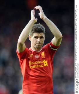 Football - 2013 2014 Premier League - Liverpool FC vs. Newcastle United Liverpool captain Steven Gerrard salutes the fans after the game at Anfield. 