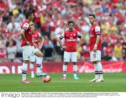 Arsenal s Mesut Özil looks on dejected after going 1-0 down Arsenal vs Hull City- FA Cup Final 2014 - Wembley Stadium - London - UK - 17 05 2014 - Pic David Klein Sportimage EDITORIAL USE ONLY. No use with unauthorised audio, video, data, fixture lists, club league logos or live services. Online in-match use limited to 120 images, no video emulation. No use in betting, games or single club league player publications.