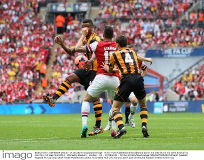 Hull s Tom Huddlestone handles the ball in his area but is not seen Arsenal vs Hull City- FA Cup Final 2014 - Wembley Stadium - London - UK - 17 05 2014 - Pic David Klein Sportimage EDITORIAL USE ONLY. No use with unauthorised audio, video, data, fixture lists, club league logos or live services. Online in-match use limited to 120 images, no video emulation. No use in betting, games or single club league player publications.