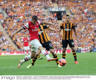 Arsenal s Aaron Ramsey scoring his sides third goal Arsenal vs Hull City- FA Cup Final 2014 - Wembley Stadium - London - UK - 17 05 2014 - Pic David Klein Sportimage EDITORIAL USE ONLY. No use with unauthorised audio, video, data, fixture lists, club league logos or live services. Online in-match use limited to 120 images, no video emulation. No use in betting, games or single club league player publications.