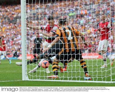 Arsenal s Laurent Koscielny scoring his sides second goal Arsenal vs Hull City- FA Cup Final 2014 - Wembley Stadium - London - UK - 17 05 2014 - Pic David Klein Sportimage EDITORIAL USE ONLY. No use with unauthorised audio, video, data, fixture lists, club league logos or live services. Online in-match use limited to 120 images, no video emulation. No use in betting, games or single club league player publications.