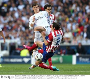 FUSSBALL - CL, Madrid vs Atletico LISSABON,PORTUGAL,24.MAI.14 - FUSSBALL - UEFA Champions League, Finale, Real Madrid vs Atletico Madrid. Bild zeigt Diego Godin (Atletico), Gareth Bale (Madrid) und Tiago (Atletico). 