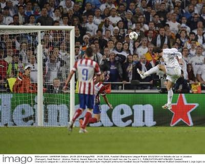 24.05.2014, Fussball Champions League Finale 2013 2014 im Estadio da Luz in Lissabon (Portugal), Real Madrid - Atletico Madrid, Gareth Bale (re, Real Madrid) köpft hier das Tor zum 2:1. 