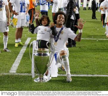 Marcelo (Real) mit Sohn Enzo und Pokal . Champions League-Sieger 2014 Real Madrid . Real Madrid-Atletico Madrid . Lissabon, POR, 24.05.2014 , Finale, Fussball-Champions League 2014.
