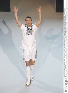 Real Madrid s Cristiano Ronaldo celebrates with supporters after winning the UEFA Champions League 2014, at Santiago Bernabeu stadium.