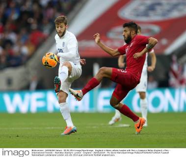 England s Adam Lallana tussles with Peru s Josepmir Ballon England v Peru - International Friendly - Wembley Stadium- London - England - 30 05 2014 - Pic David Klein Sportimage EDITORIAL USE ONLY. No use with unauthorised audio, video, data, fixture lists, club league logos or live services. Online in-match use limited to 120 images, no video emulation. No use in betting, games or single club league player publications.