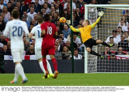 England goalkeeper Joe Hart makes a diving save - International Friendly - England vs Peru - Wembley Stadium - London - 30 05 2014 - Pic Charlie Forgham-Bailey Sportimage EDITORIAL USE ONLY. No use with unauthorised audio, video, data, fixture lists, club league logos or live services. Online in-match use limited to 120 images, no video emulation. No use in betting, games or single club league player publications.