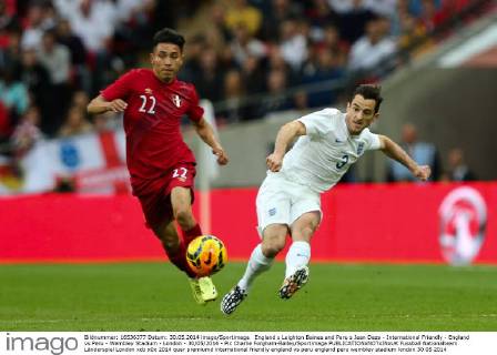 England s Leighton Baines and Peru s Jean Deza - International Friendly - England vs Peru - Wembley Stadium - London - 30 05 2014 - Pic Charlie Forgham-Bailey Sportimage EDITORIAL USE ONLY. No use with unauthorised audio, video, data, fixture lists, club league logos or live services. Online in-match use limited to 120 images, no video emulation. No use in betting, games or single club league player publications.