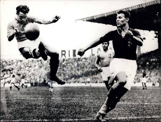 Jun. 19, 1938 - World Cup 1938: Italy v Hungary. Photo shows the moment when Italian player Alfredo Foni (L) executes a back-flip.  - ZUMAk09