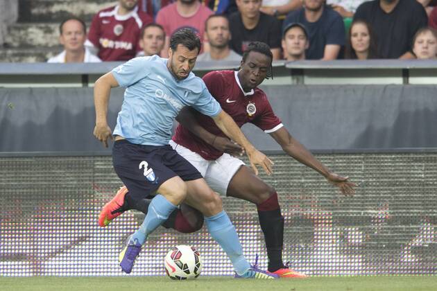 Matias Concha of Malmo (left) and Costa Nhamoinesu of Sparta are pictured during the UEFA Champions League 3rd qualifying round opening match AC Sparta Praha vs. Malmo FF, Prague, Czech Republic, on Tuesday, July 29, 2014. (CTKxPhoto MichalxKamaryt) CTKPhotoOF201407291166501  kmt 1