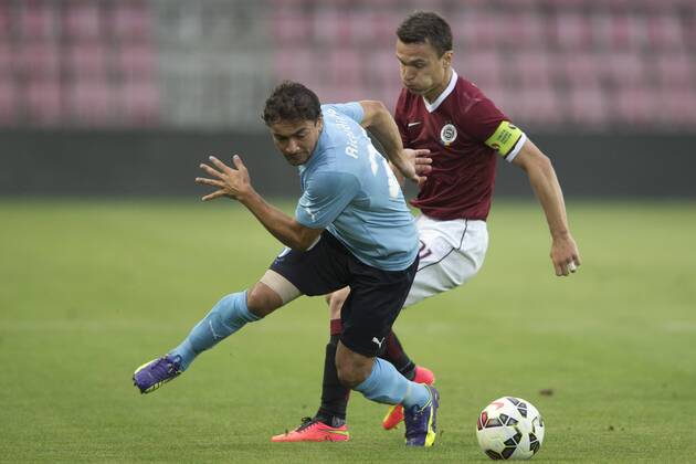 Ricardinho of Malmo (left) and David Lafata of Sparta are pictured during the UEFA Champions League 3rd qualifying round opening match AC Sparta Praha vs. Malmo FF, Prague, Czech Republic, on Tuesday, July 29, 2014. (CTKxPhoto MichalxKamaryt) CTKPhotoOF201407291166601  kmt 2