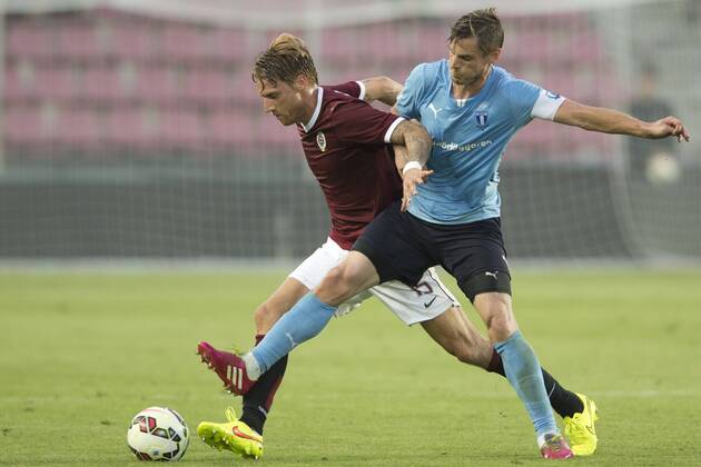 Markus Rosenberg of Malmo (right) and Radoslav Kovac of Sparta are pictured during the UEFA Champions League 3rd qualifying round opening match AC Sparta Praha vs. Malmo FF, Prague, Czech Republic, on Tuesday, July 29, 2014. (CTKxPhoto MichalxKamaryt) CTKPhotoOF201407291200101  kmt 6