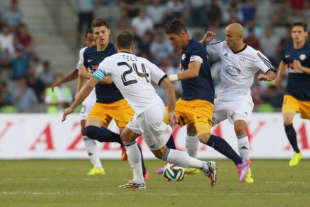 SOCCER - CL, Karabag vs RBS BAKU,AZERBAIJAN,30.JUL.14 - SOCCER - UEFA Champions League, qualifying, Karabag Agdam FK vs Red Bull Salzburg. Image shows Marcel Sabitzer (RBS), Admir Teli (Karabag), Jonathan Soriano (RBS) and Richard Almeida (Karabag).