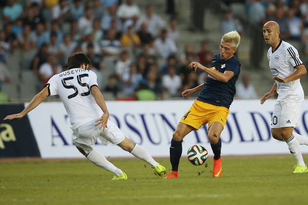 SOCCER - CL, Karabag vs RBS BAKU,AZERBAIJAN,30.JUL.14 - SOCCER - UEFA Champions League, qualifying, Karabag Agdam FK vs Red Bull Salzburg. Image shows Badavi Guseynov (Karabag) and Kevin Kampl (RBS).