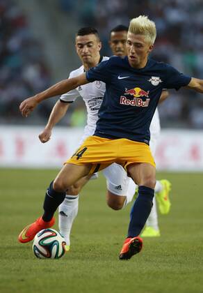 SOCCER - CL, Karabag vs RBS BAKU,AZERBAIJAN,30.JUL.14 - SOCCER - UEFA Champions League, qualifying, Karabag Agdam FK vs Red Bull Salzburg. Image shows Kevin Kampl (RBS) and Gara Garayev (Karabag).