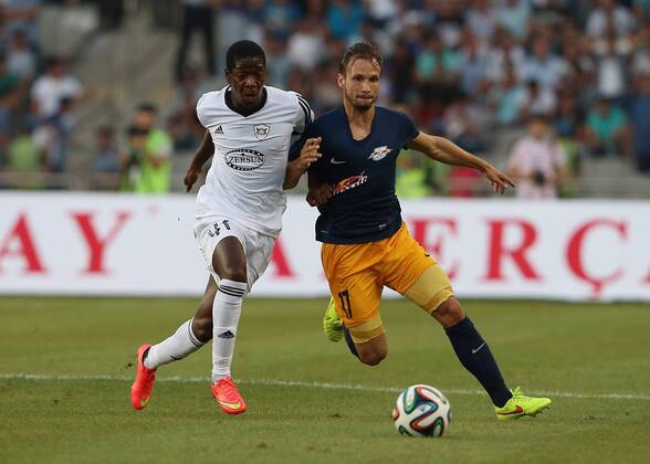 SOCCER - CL, Karabag vs RBS BAKU,AZERBAIJAN,30.JUL.14 - SOCCER - UEFA Champions League, qualifying, Karabag Agdam FK vs Red Bull Salzburg. Image shows Leroy George (Karabag) and Andreas Ulmer (RBS). 