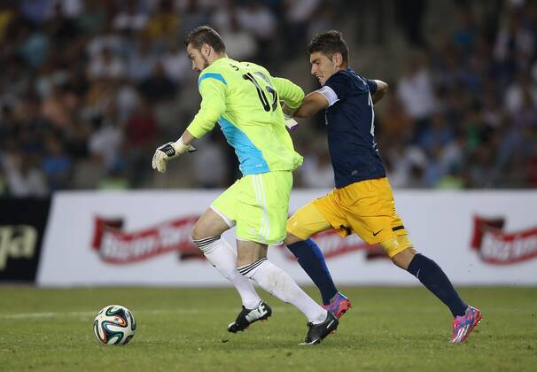 SOCCER - CL, Qarabag vs RBS BAKU,AZERBAIJAN,30.JUL.14 - SOCCER - UEFA Champions League, qualifying, Qarabag Agdam FK vs Red Bull Salzburg. Image shows Ibrahim Sehic (Qarabag) and Jonatan Soriano (RBS).